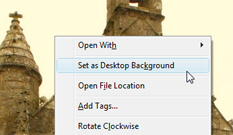 Change the desktop wallpaper through Windows Photo Gallery