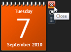 Close the calendar gadget to hide / remove it from your desktop