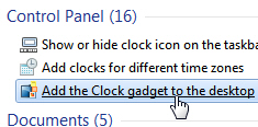 Get the clock gadget and add it to your Windows 7 desktop